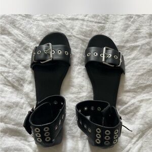 Balenciaga Black Sandals with Edgy Metal Hardware